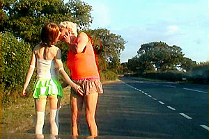 Zoe and Lisa cocksucking in public